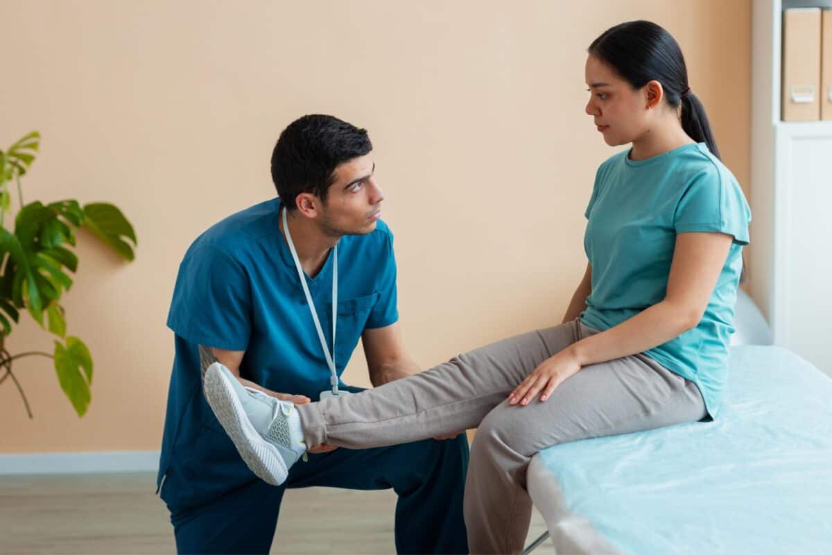 doctor-helping-patient-rehabilitation-3-1200x800.jpg