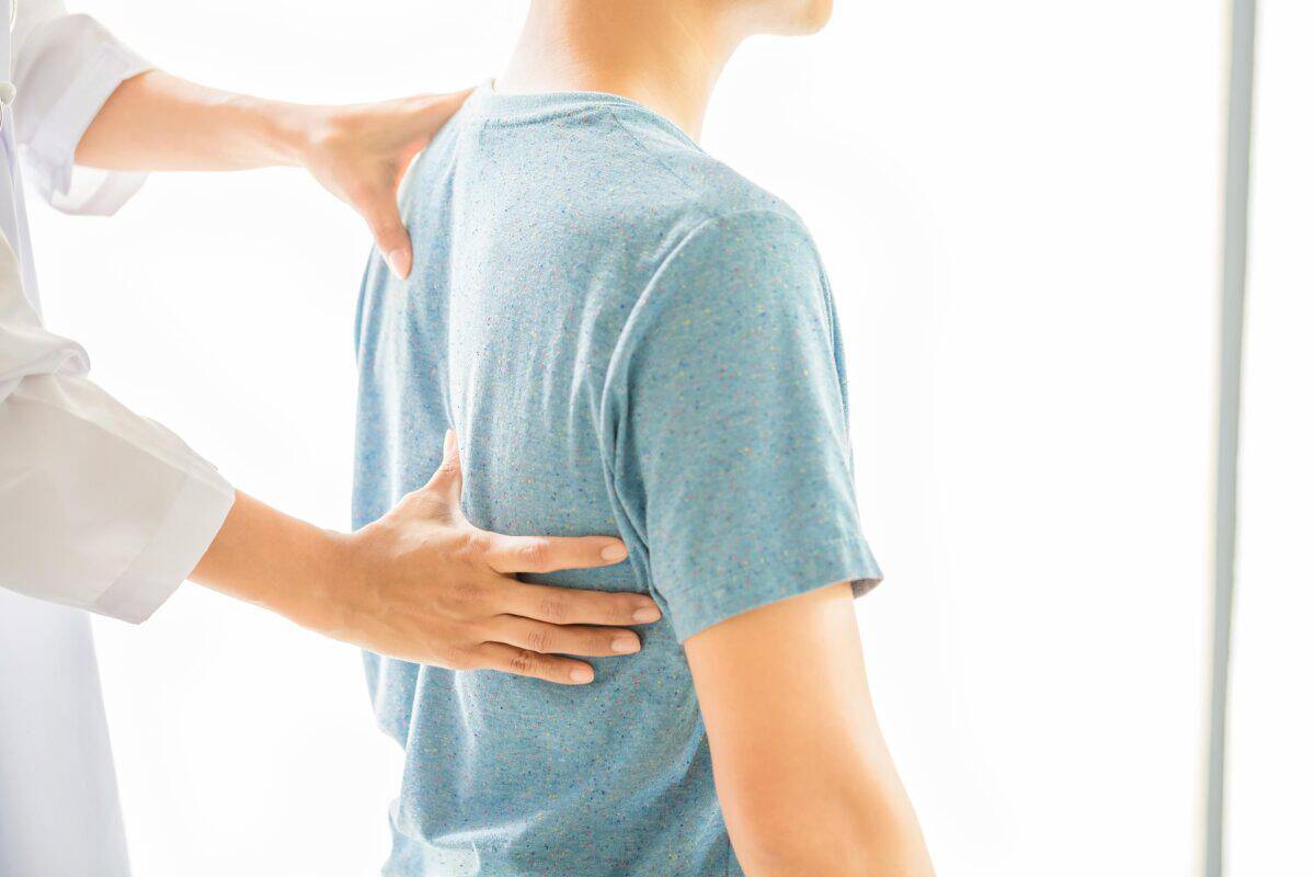 close-up-physiotherapist-working-with-patient-clinic-1200x800.jpg